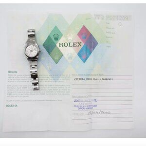 MINT LADIES ROLEX SILVER WITH PAPERS